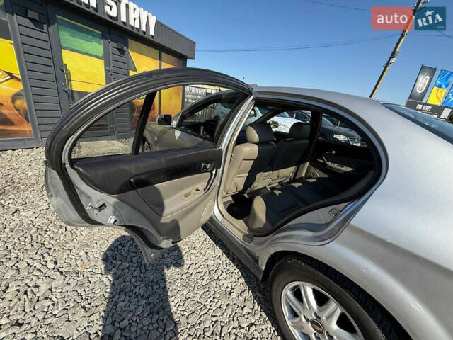 Серый Шевроле Эванда, объемом двигателя 2 л и пробегом 242 тыс. км за 3300 $, фото 31 на Automoto.ua