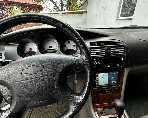 Серый Шевроле Эванда, объемом двигателя 2 л и пробегом 195 тыс. км за 2750 $, фото 4 на Automoto.ua