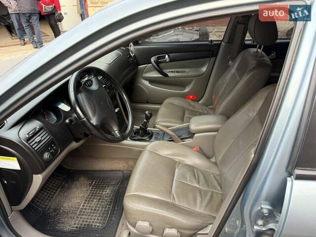 Сірий Шевроле Еванда, об'ємом двигуна 2 л та пробігом 173 тис. км за 3800 $, фото 5 на Automoto.ua