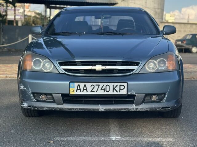 Серый Шевроле Эванда, объемом двигателя 2 л и пробегом 255 тыс. км за 2770 $, фото 4 на Automoto.ua