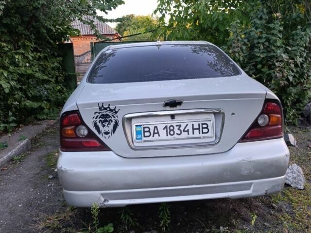 Серый Шевроле Эванда, объемом двигателя 2 л и пробегом 180 тыс. км за 1800 $, фото 4 на Automoto.ua