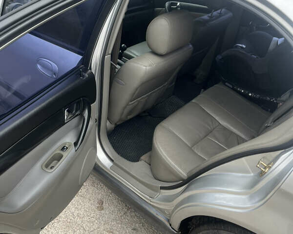 Серый Шевроле Эванда, объемом двигателя 2 л и пробегом 289 тыс. км за 3700 $, фото 4 на Automoto.ua