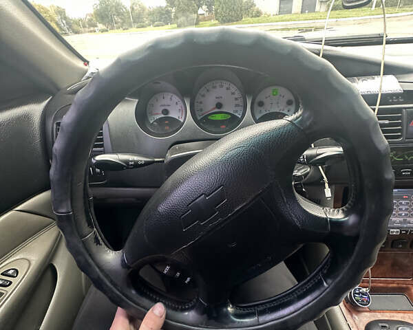 Шевроле Эванда 2005 в Каменское - Днепродзержинск на Automoto.ua Серый Шевроле Эванда, объемом двигателя 2 л и пробегом 237 тыс. км за 2300 $, фото 4 на Automoto.ua