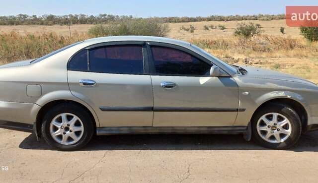 Серый Шевроле Эванда, объемом двигателя 2 л и пробегом 283 тыс. км за 2800 $, фото 12 на Automoto.ua