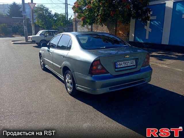 Серый Шевроле Эванда, объемом двигателя 2 л и пробегом 288 тыс. км за 3400 $, фото 4 на Automoto.ua