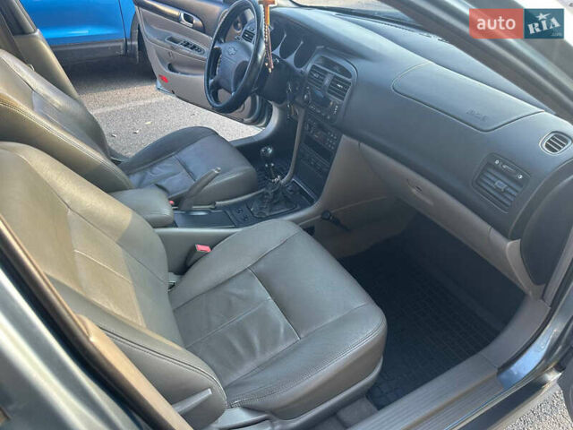 Сірий Шевроле Еванда, об'ємом двигуна 2 л та пробігом 255 тис. км за 2600 $, фото 10 на Automoto.ua