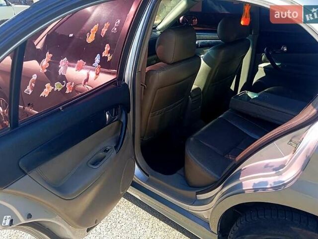 Сірий Шевроле Еванда, об'ємом двигуна 2 л та пробігом 288 тис. км за 3400 $, фото 8 на Automoto.ua