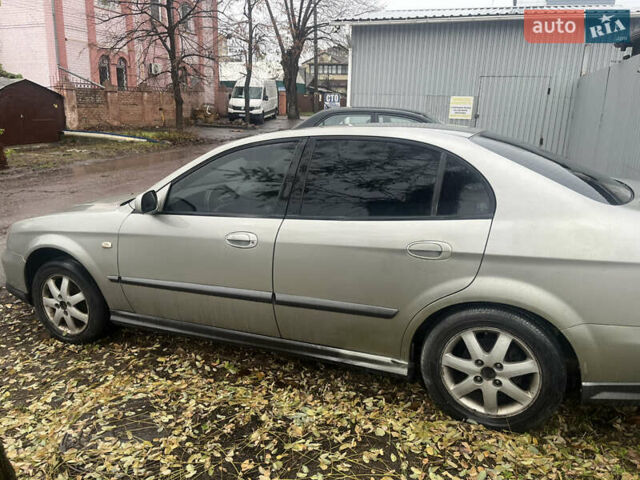 Серый Шевроле Эванда, объемом двигателя 2 л и пробегом 300 тыс. км за 3200 $, фото 6 на Automoto.ua