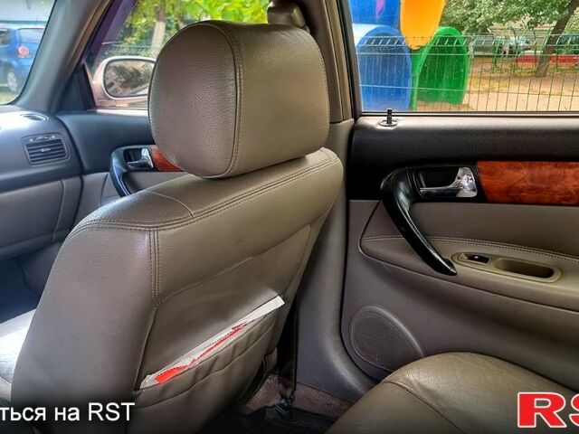 Серый Шевроле Эванда, объемом двигателя 2 л и пробегом 344 тыс. км за 3800 $, фото 9 на Automoto.ua