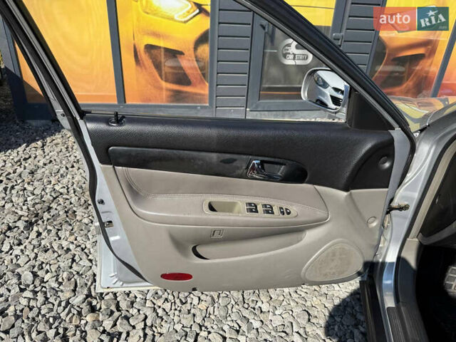Серый Шевроле Эванда, объемом двигателя 2 л и пробегом 242 тыс. км за 3100 $, фото 33 на Automoto.ua