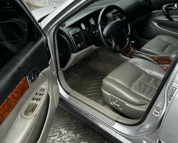 Серый Шевроле Эванда, объемом двигателя 2 л и пробегом 195 тыс. км за 2750 $, фото 2 на Automoto.ua