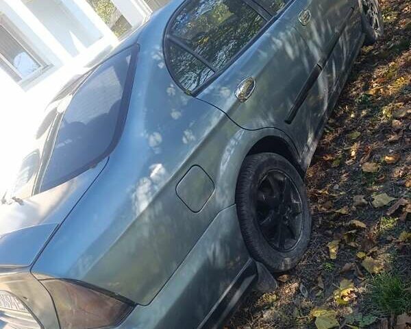 Серый Шевроле Эванда, объемом двигателя 2 л и пробегом 250 тыс. км за 2800 $, фото 3 на Automoto.ua