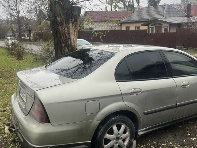 Сірий Шевроле Еванда, об'ємом двигуна 2 л та пробігом 300 тис. км за 3200 $, фото 3 на Automoto.ua