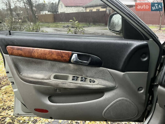 Серый Шевроле Эванда, объемом двигателя 2 л и пробегом 300 тыс. км за 3200 $, фото 12 на Automoto.ua