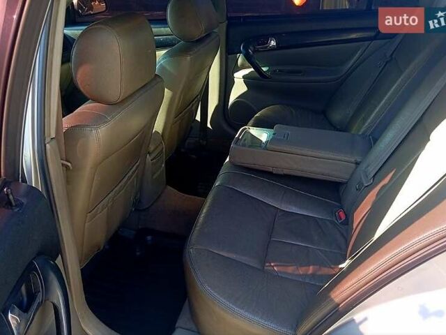 Сірий Шевроле Еванда, об'ємом двигуна 2 л та пробігом 288 тис. км за 3400 $, фото 7 на Automoto.ua