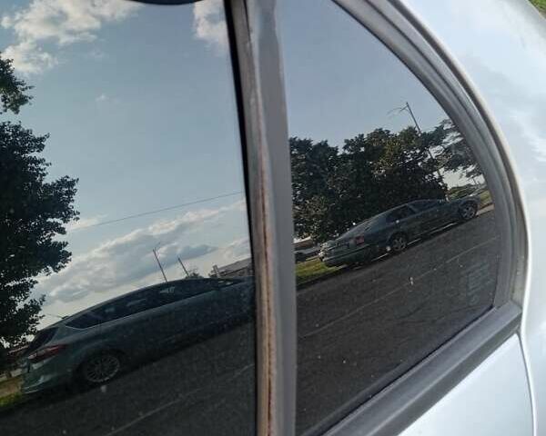 Серый Шевроле Эванда, объемом двигателя 2 л и пробегом 215 тыс. км за 2900 $, фото 20 на Automoto.ua