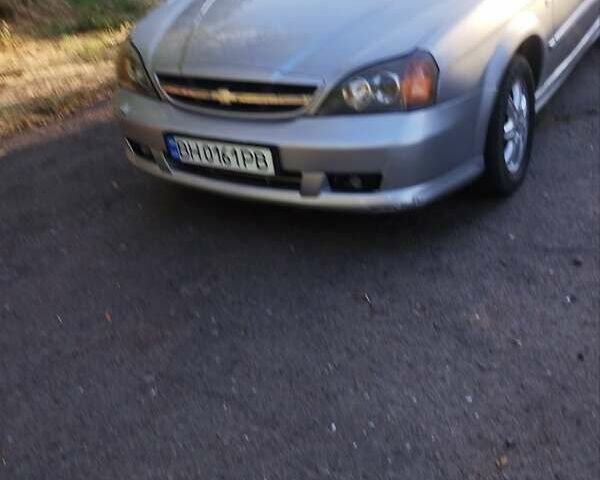 Сірий Шевроле Еванда, об'ємом двигуна 2 л та пробігом 400 тис. км за 3600 $, фото 1 на Automoto.ua