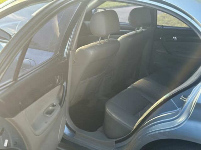 Серый Шевроле Эванда, объемом двигателя 2 л и пробегом 255 тыс. км за 2770 $, фото 9 на Automoto.ua