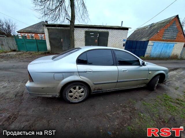 Серый Шевроле Эванда, объемом двигателя 2 л и пробегом 180 тыс. км за 3200 $, фото 7 на Automoto.ua