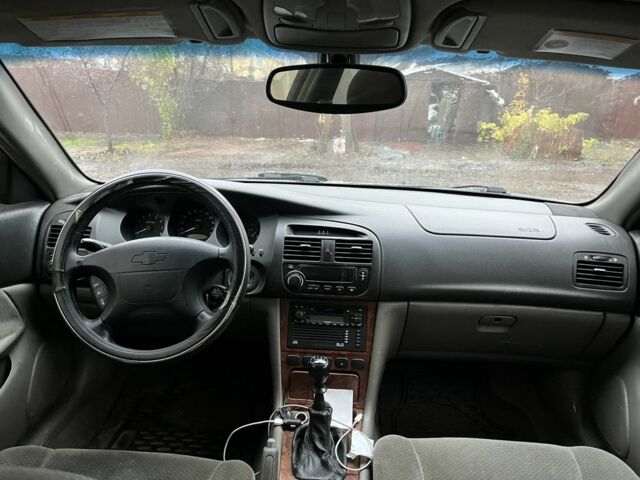 Сірий Шевроле Еванда, об'ємом двигуна 2 л та пробігом 300 тис. км за 3200 $, фото 11 на Automoto.ua