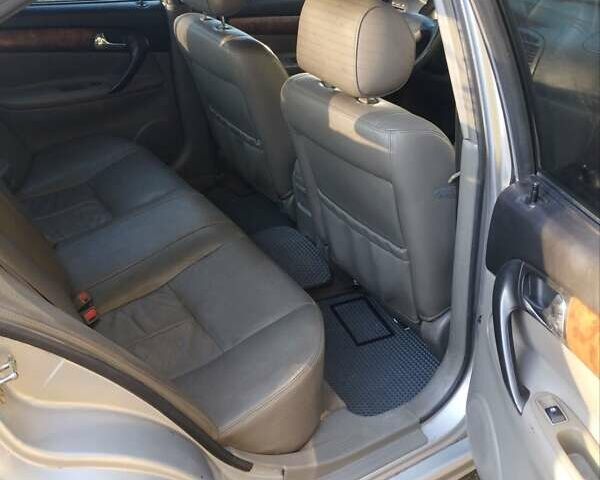 Сірий Шевроле Еванда, об'ємом двигуна 2 л та пробігом 400 тис. км за 3600 $, фото 4 на Automoto.ua