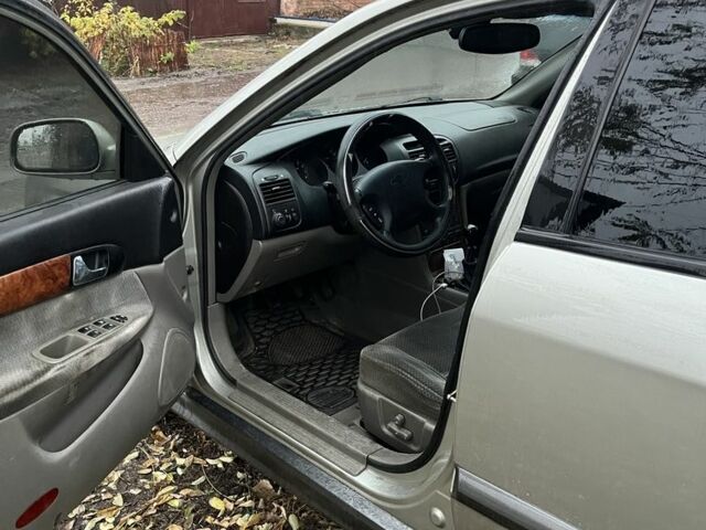 Сірий Шевроле Еванда, об'ємом двигуна 2 л та пробігом 300 тис. км за 3200 $, фото 13 на Automoto.ua