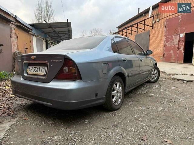 Сірий Шевроле Еванда, об'ємом двигуна 2 л та пробігом 173 тис. км за 3800 $, фото 2 на Automoto.ua