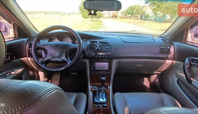 Серый Шевроле Эванда, объемом двигателя 2 л и пробегом 283 тыс. км за 2800 $, фото 4 на Automoto.ua