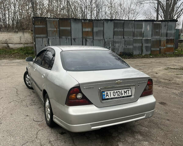 Серый Шевроле Эванда, объемом двигателя 2 л и пробегом 289 тыс. км за 3700 $, фото 1 на Automoto.ua