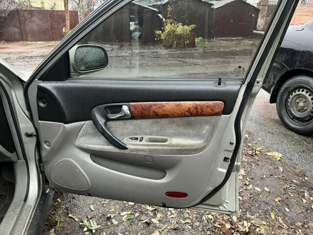 Сірий Шевроле Еванда, об'ємом двигуна 2 л та пробігом 300 тис. км за 3200 $, фото 9 на Automoto.ua