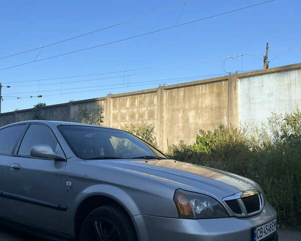 Сірий Шевроле Еванда, об'ємом двигуна 2 л та пробігом 326 тис. км за 2000 $, фото 14 на Automoto.ua