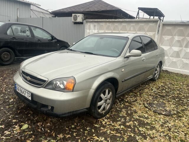 Сірий Шевроле Еванда, об'ємом двигуна 2 л та пробігом 300 тис. км за 3200 $, фото 7 на Automoto.ua