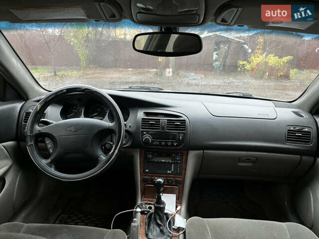 Серый Шевроле Эванда, объемом двигателя 2 л и пробегом 300 тыс. км за 3200 $, фото 14 на Automoto.ua