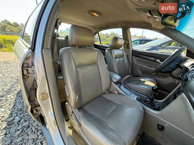 Серый Шевроле Эванда, объемом двигателя 2 л и пробегом 242 тыс. км за 3300 $, фото 18 на Automoto.ua