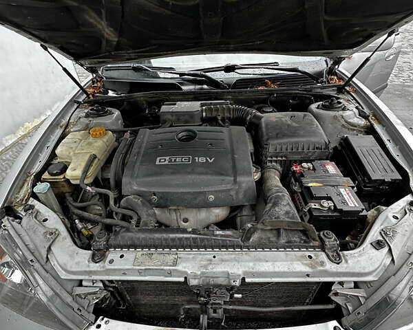 Серый Шевроле Эванда, объемом двигателя 2 л и пробегом 195 тыс. км за 2750 $, фото 5 на Automoto.ua