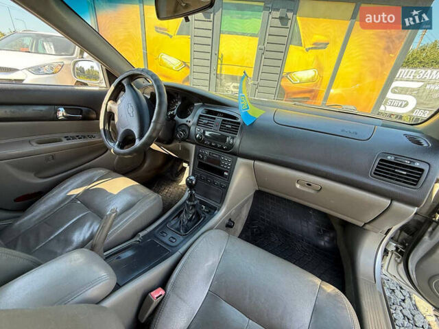 Серый Шевроле Эванда, объемом двигателя 2 л и пробегом 242 тыс. км за 3300 $, фото 20 на Automoto.ua