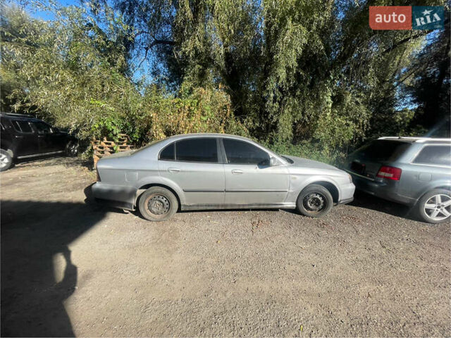 Серый Шевроле Эванда, объемом двигателя 2 л и пробегом 300 тыс. км за 1300 $, фото 1 на Automoto.ua