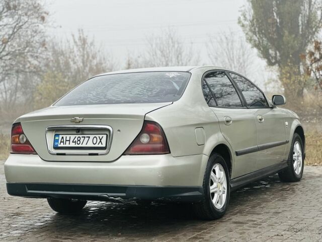 Серый Шевроле Эванда, объемом двигателя 2 л и пробегом 300 тыс. км за 1999 $, фото 3 на Automoto.ua