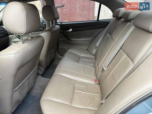 Сірий Шевроле Еванда, об'ємом двигуна 2 л та пробігом 173 тис. км за 3800 $, фото 8 на Automoto.ua