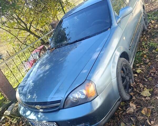 Серый Шевроле Эванда, объемом двигателя 2 л и пробегом 250 тыс. км за 2650 $, фото 6 на Automoto.ua