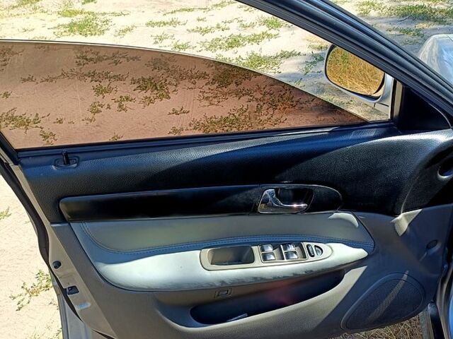 Серый Шевроле Эванда, объемом двигателя 2 л и пробегом 260 тыс. км за 3550 $, фото 6 на Automoto.ua