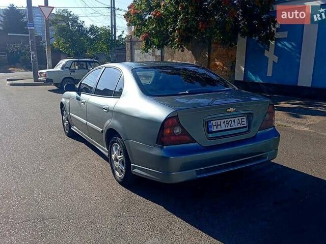 Сірий Шевроле Еванда, об'ємом двигуна 2 л та пробігом 288 тис. км за 3400 $, фото 3 на Automoto.ua