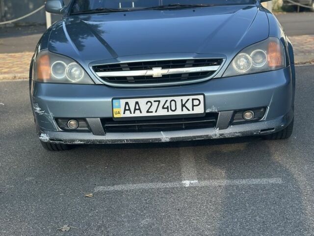 Серый Шевроле Эванда, объемом двигателя 2 л и пробегом 255 тыс. км за 2770 $, фото 2 на Automoto.ua