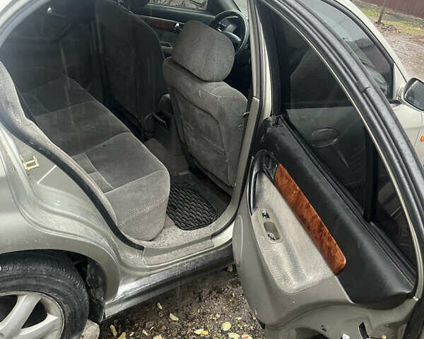 Серый Шевроле Эванда, объемом двигателя 2 л и пробегом 300 тыс. км за 3200 $, фото 8 на Automoto.ua