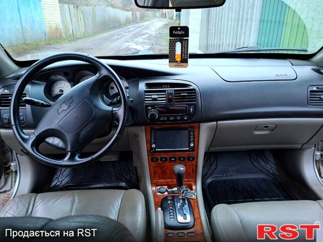 Серый Шевроле Эванда, объемом двигателя 2 л и пробегом 180 тыс. км за 3200 $, фото 1 на Automoto.ua