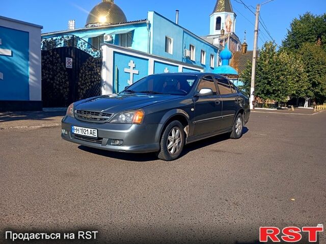 Серый Шевроле Эванда, объемом двигателя 2 л и пробегом 288 тыс. км за 3400 $, фото 6 на Automoto.ua