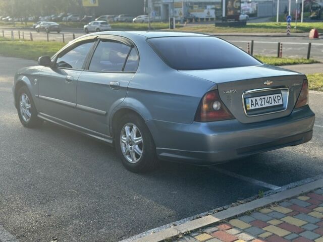 Серый Шевроле Эванда, объемом двигателя 2 л и пробегом 255 тыс. км за 2770 $, фото 8 на Automoto.ua