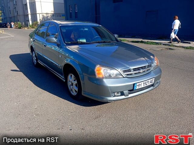 Серый Шевроле Эванда, объемом двигателя 2 л и пробегом 288 тыс. км за 3400 $, фото 3 на Automoto.ua