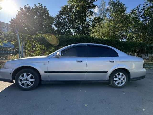 Серый Шевроле Эванда, объемом двигателя 2 л и пробегом 209 тыс. км за 3200 $, фото 1 на Automoto.ua