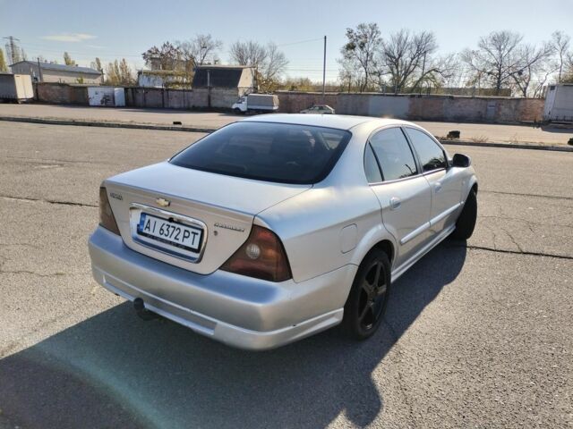 Серый Шевроле Эванда, объемом двигателя 2 л и пробегом 352 тыс. км за 3000 $, фото 3 на Automoto.ua